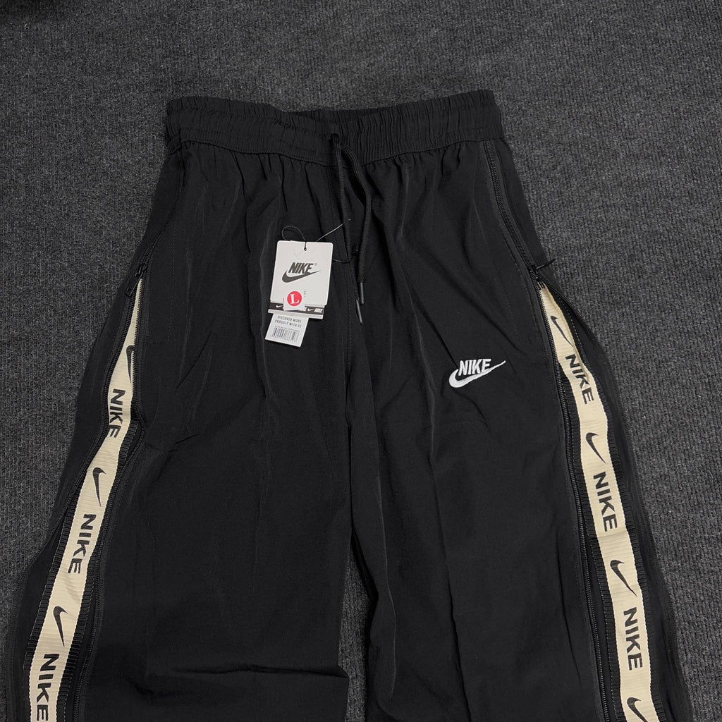 NIKE BLACK CONVERTIBLE TRACK