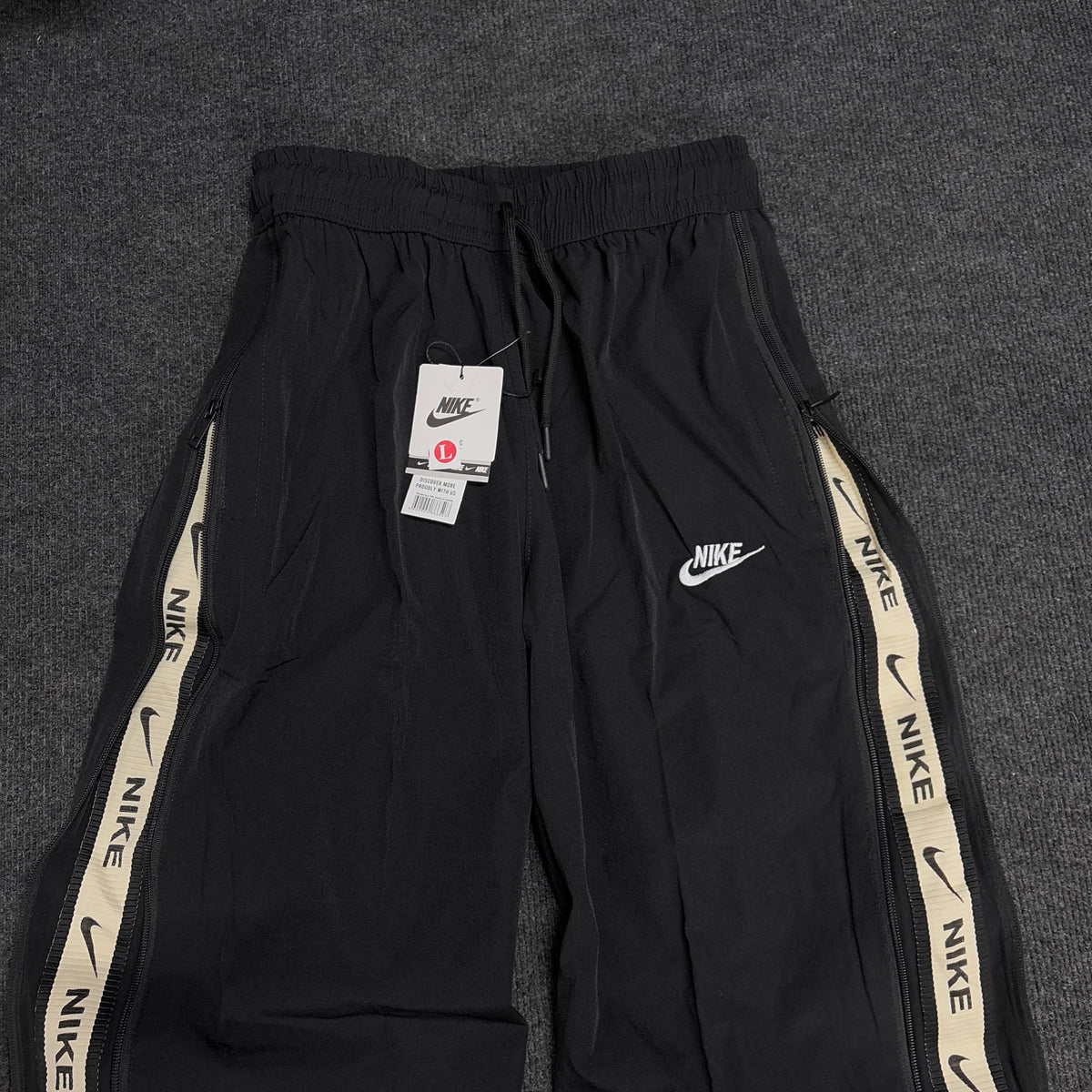 NIKE BLACK CONVERTIBLE TRACK