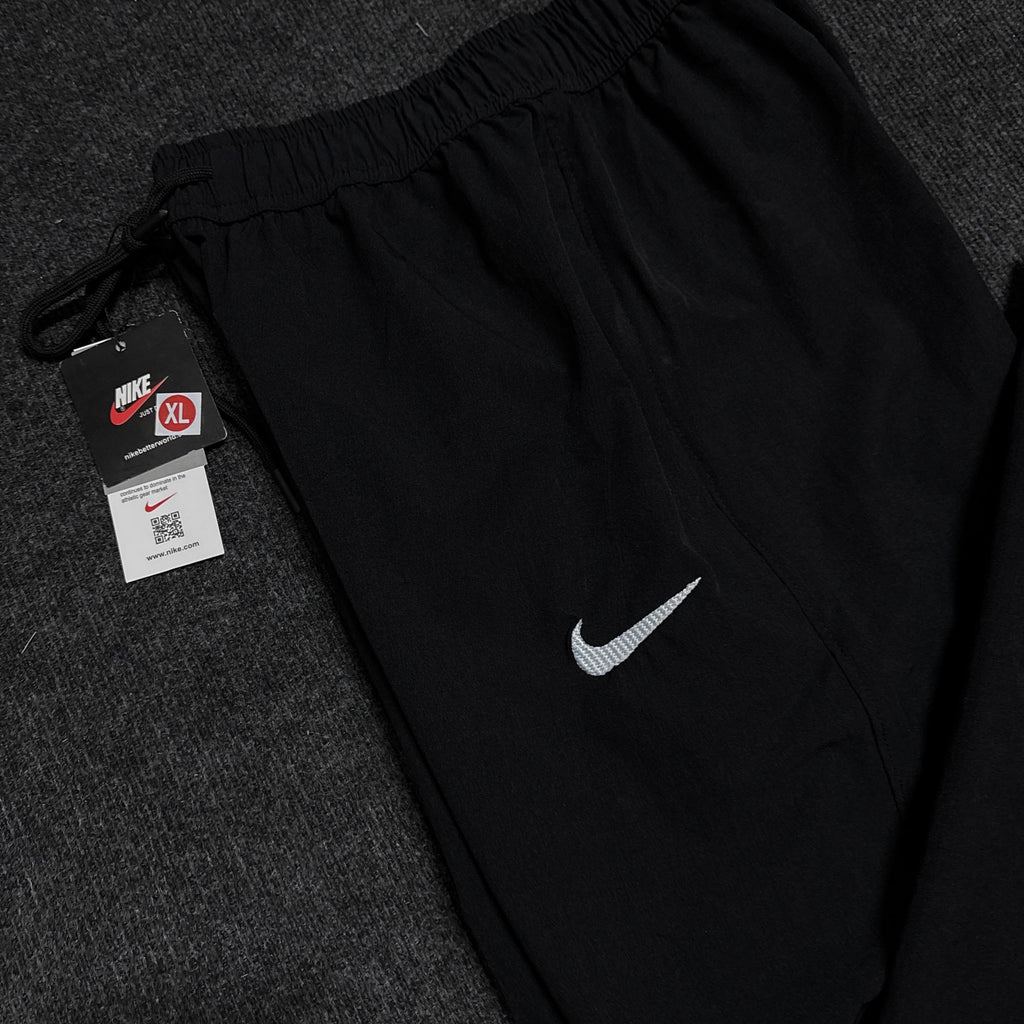 NIKE BLACK TRACK