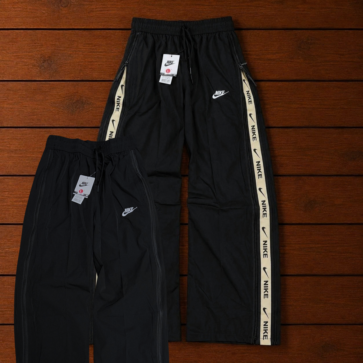 NIKE BLACK CONVERTIBLE TRACK