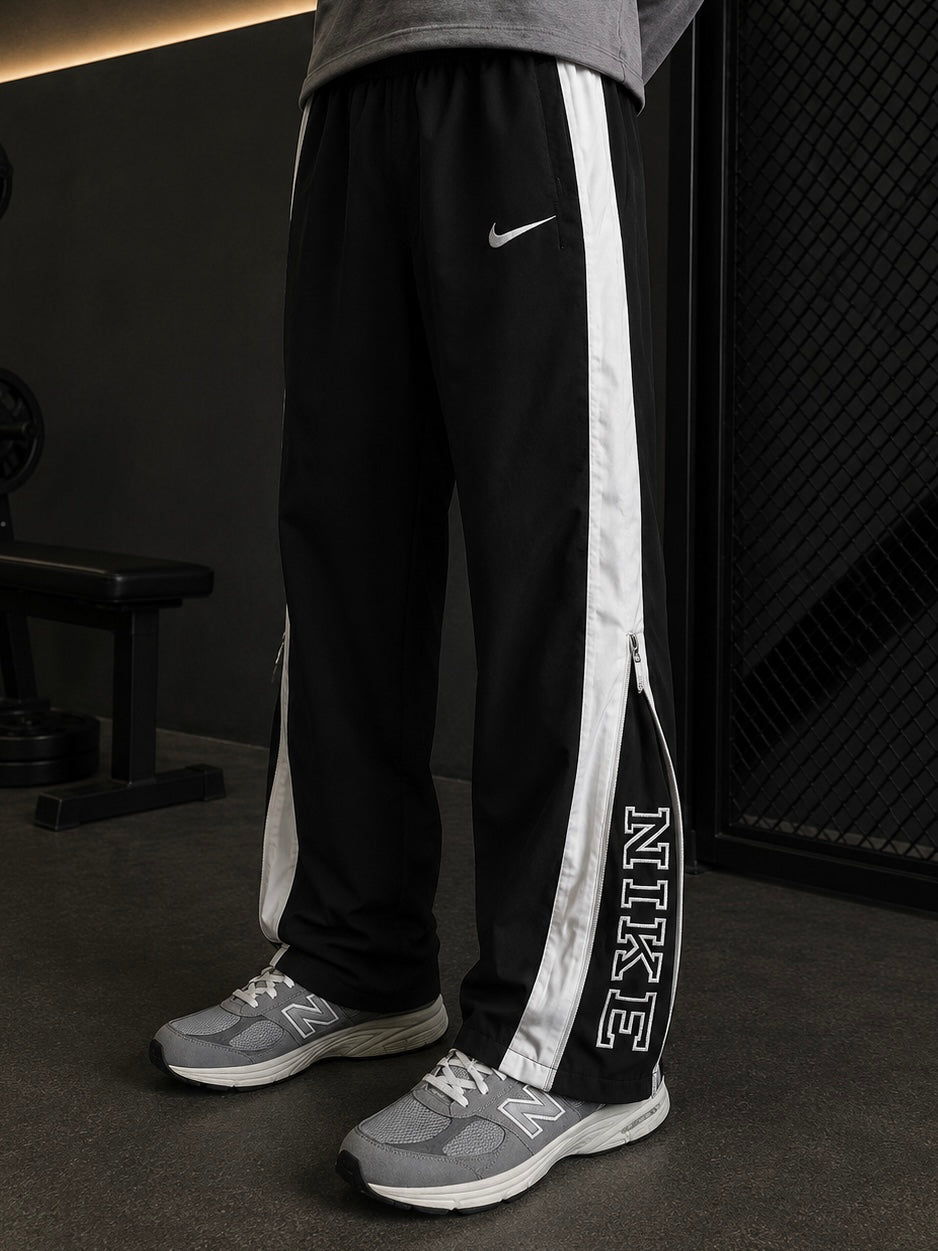 NIKE BLACK CONVERTIBLE TRACK