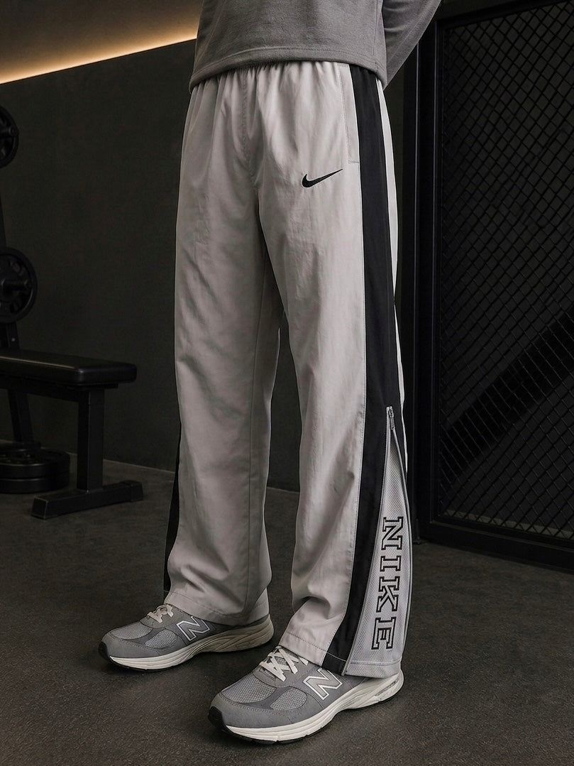 NIKE SILVER CONVERTIBLE TRACK