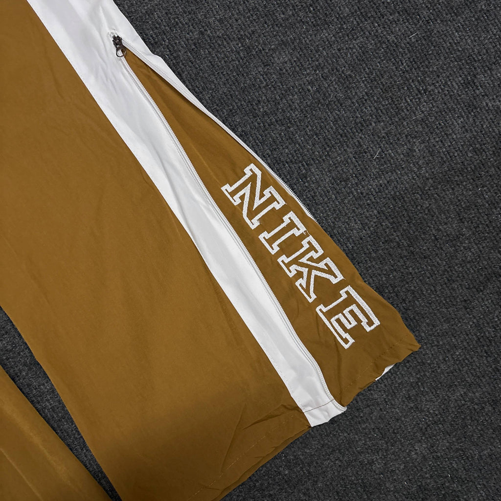 NIKE GOLDEN BROWN TRACK