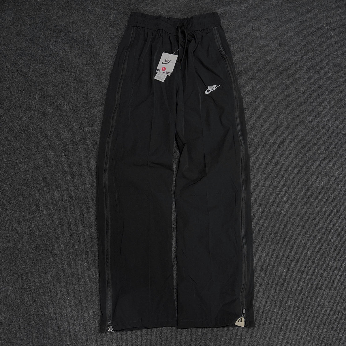 NIKE BLACK CONVERTIBLE TRACK