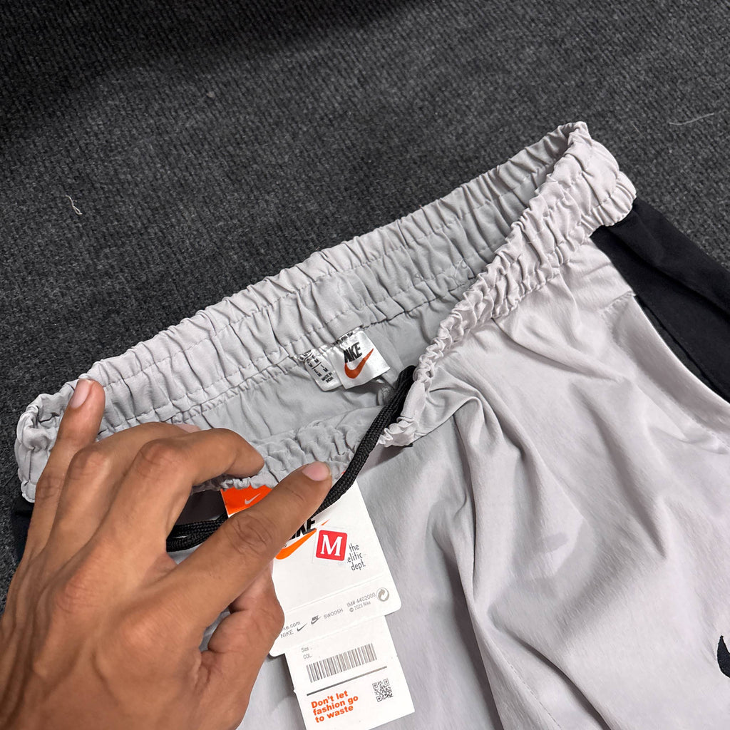 NIKE SILVER CONVERTIBLE TRACK
