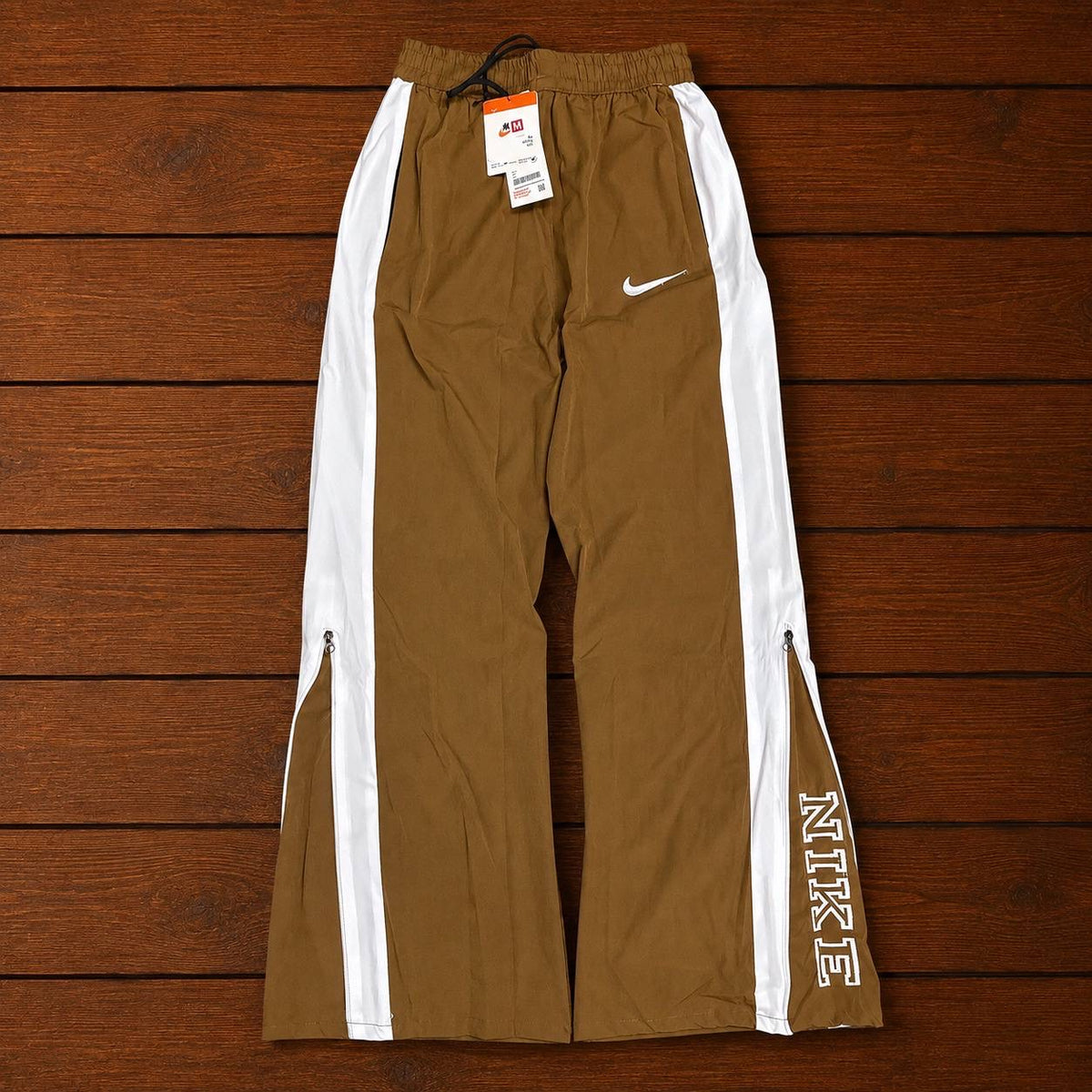 NIKE GOLDEN BROWN TRACK