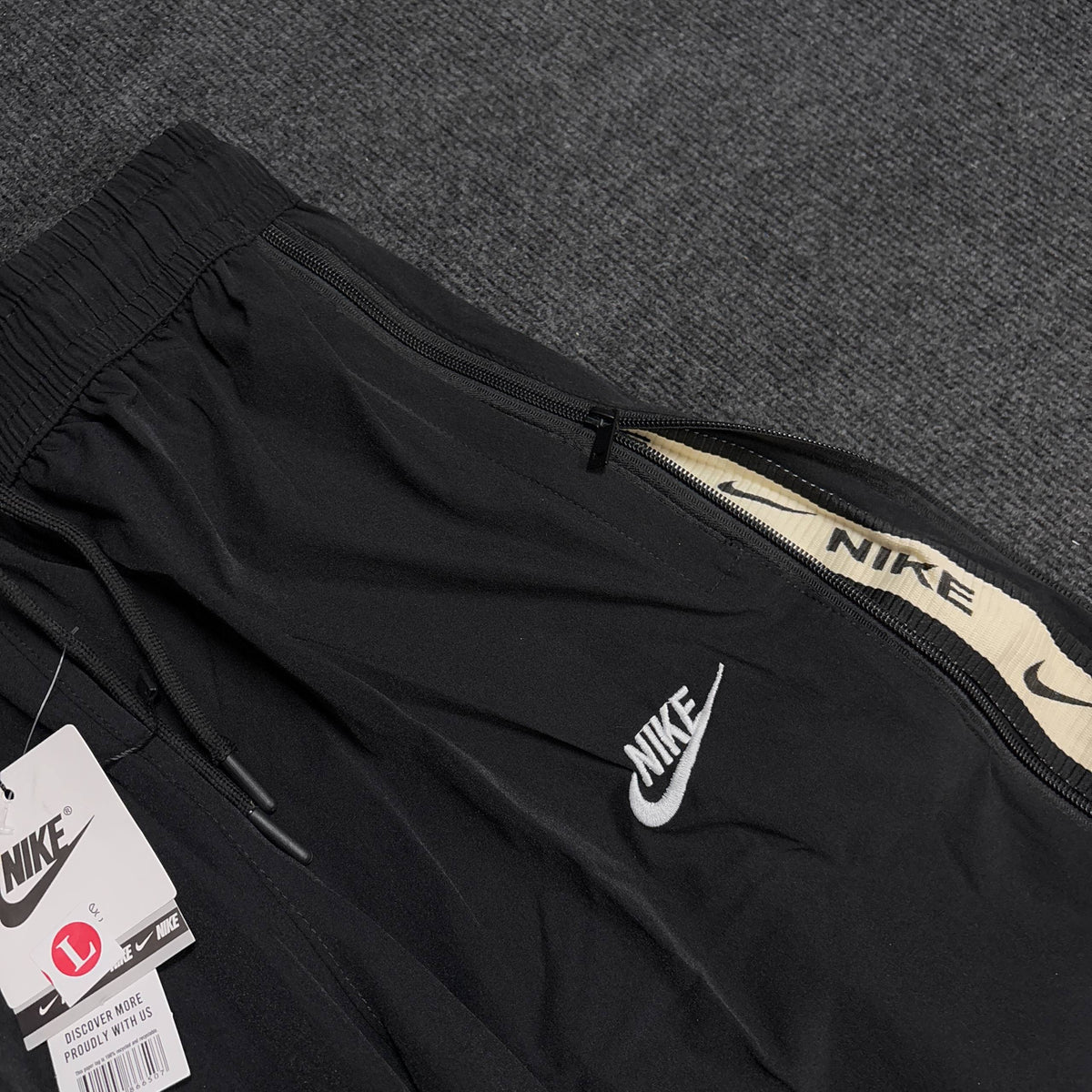 NIKE BLACK CONVERTIBLE TRACK