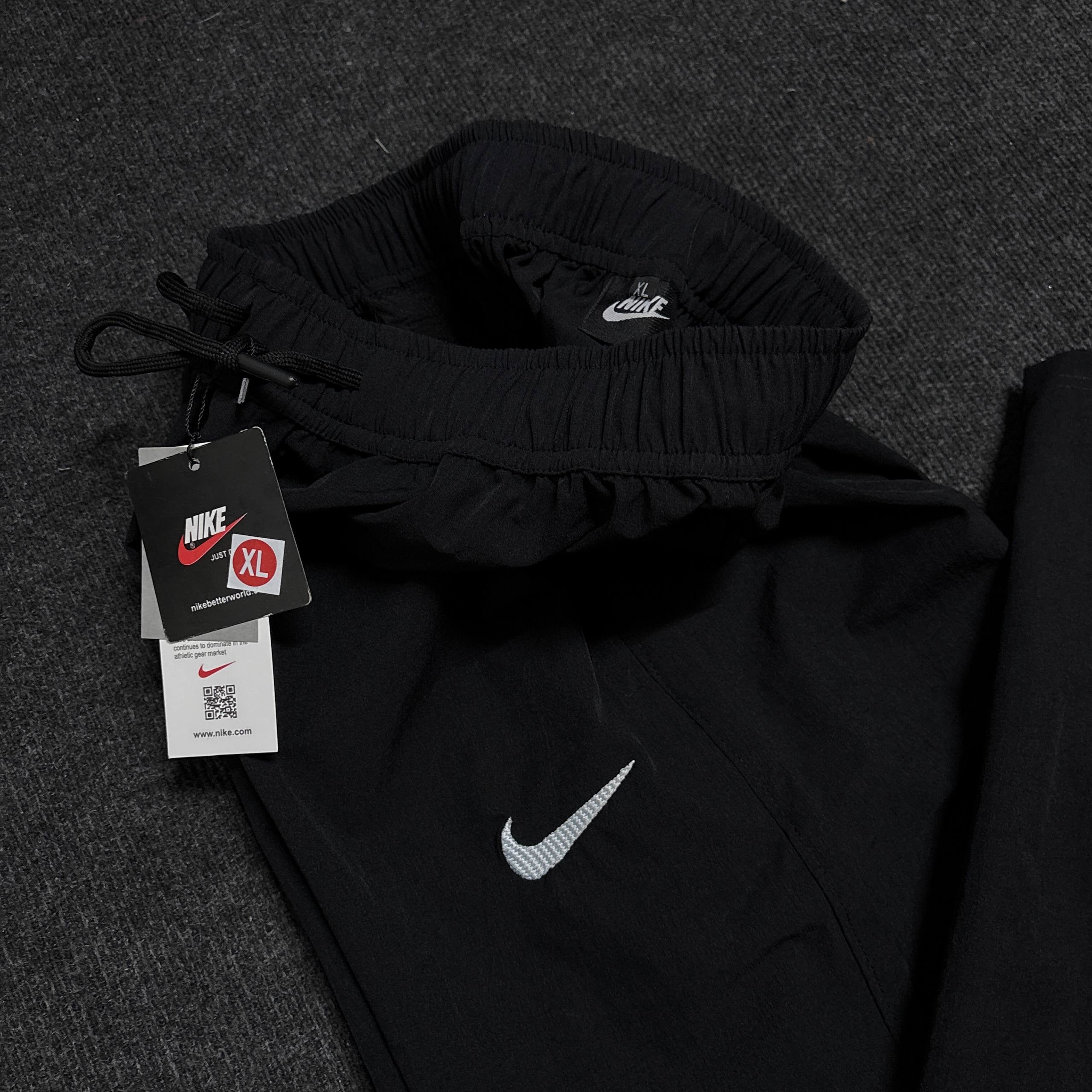 NIKE BLACK TRACK