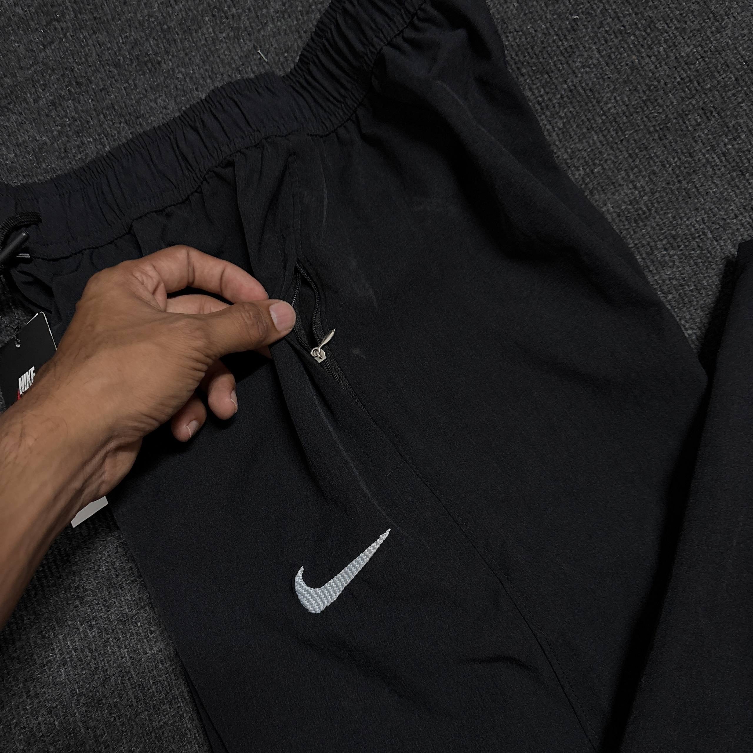 NIKE BLACK TRACK