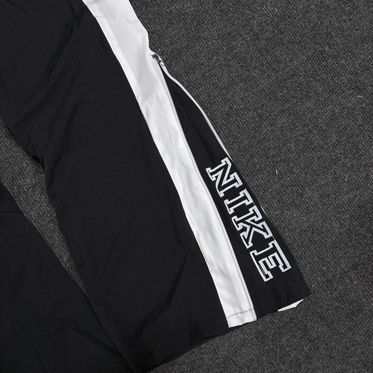 NIKE BLACK CONVERTIBLE TRACK