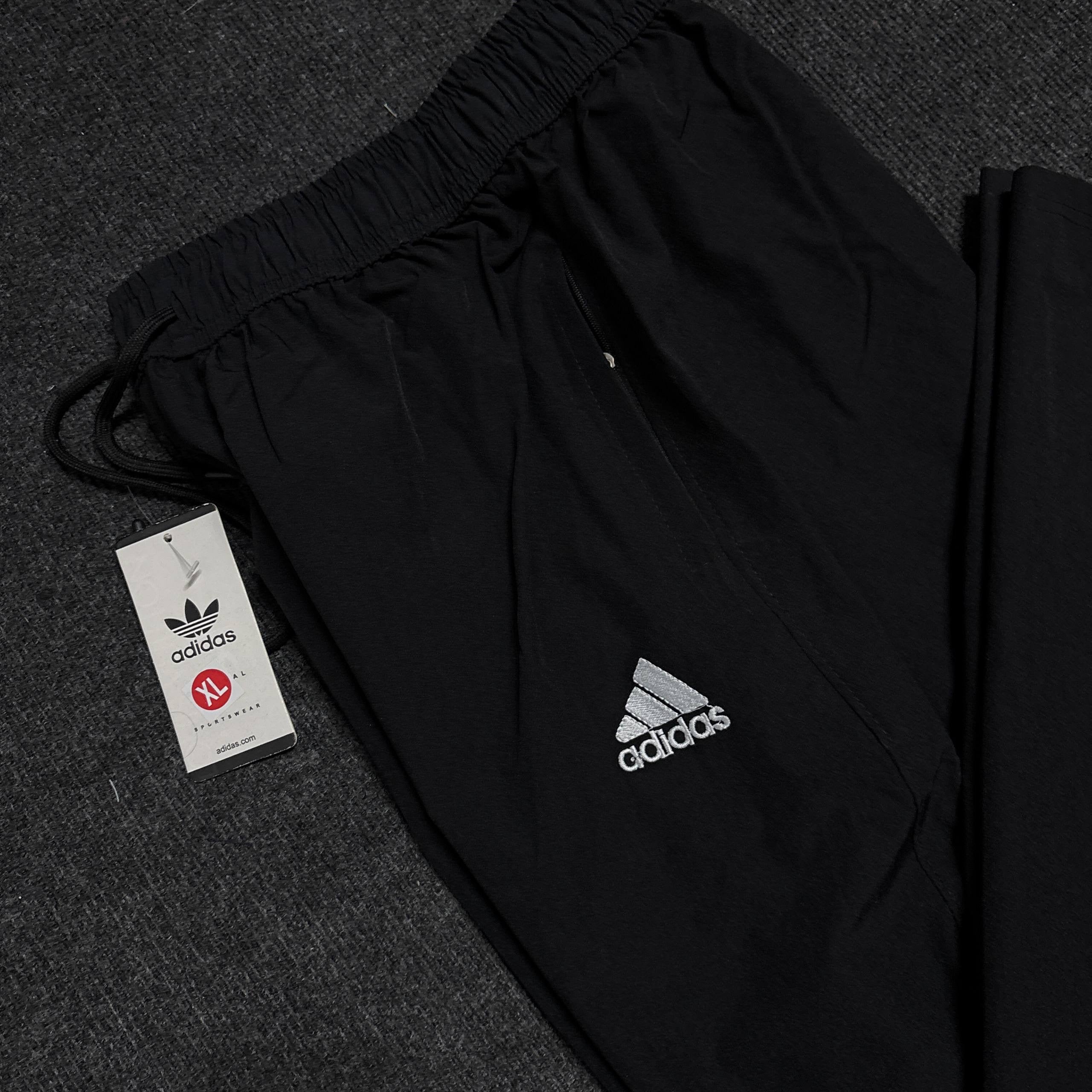 ADIDS BLACK TRACK