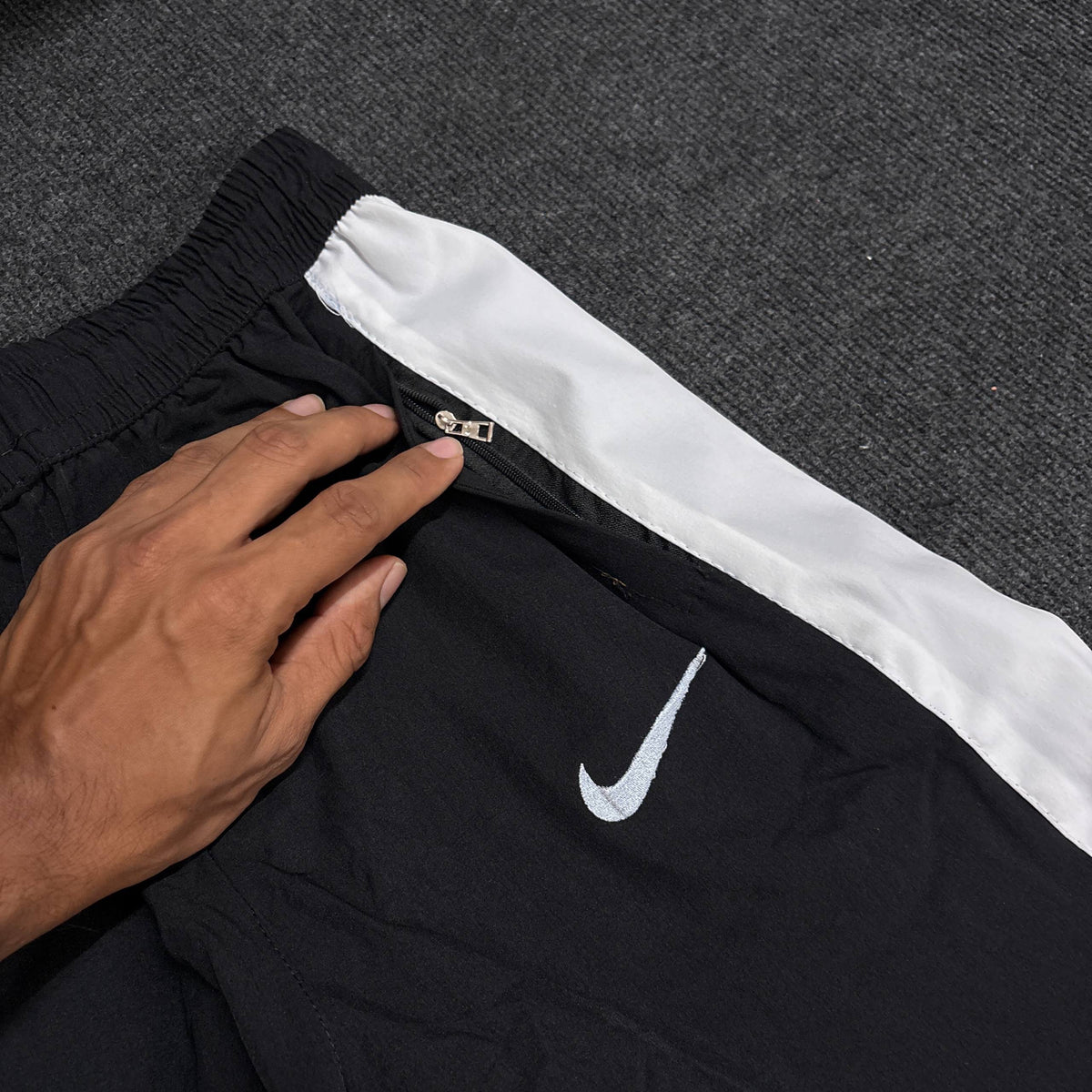 NIKE BLACK CONVERTIBLE TRACK