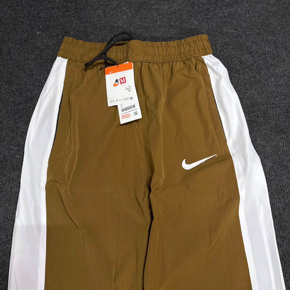 NIKE GOLDEN BROWN TRACK
