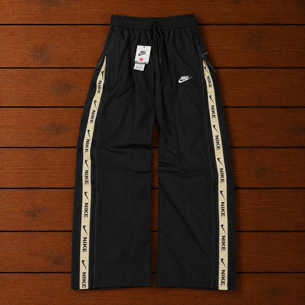 NIKE BLACK CONVERTIBLE TRACK