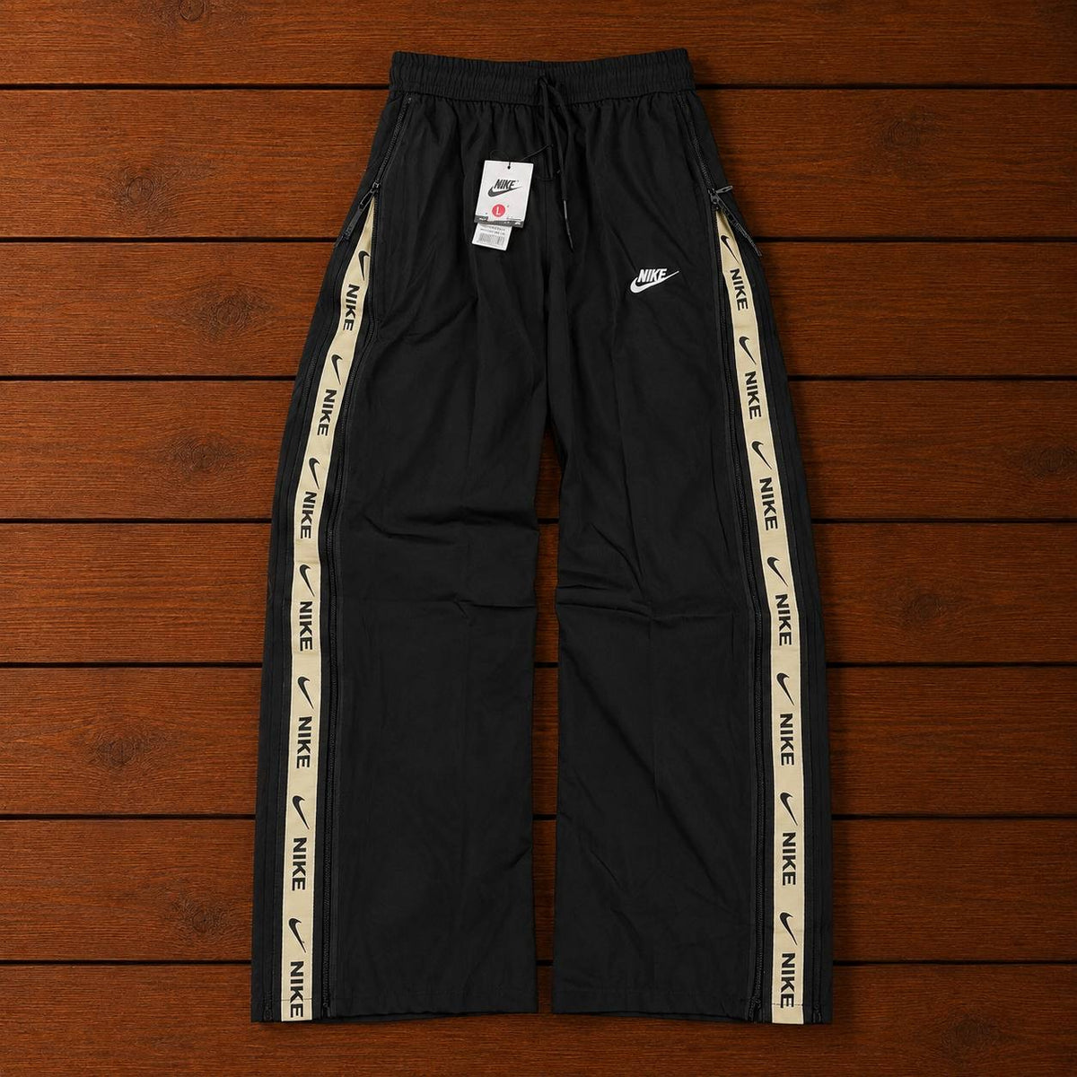 NIKE BLACK CONVERTIBLE TRACK
