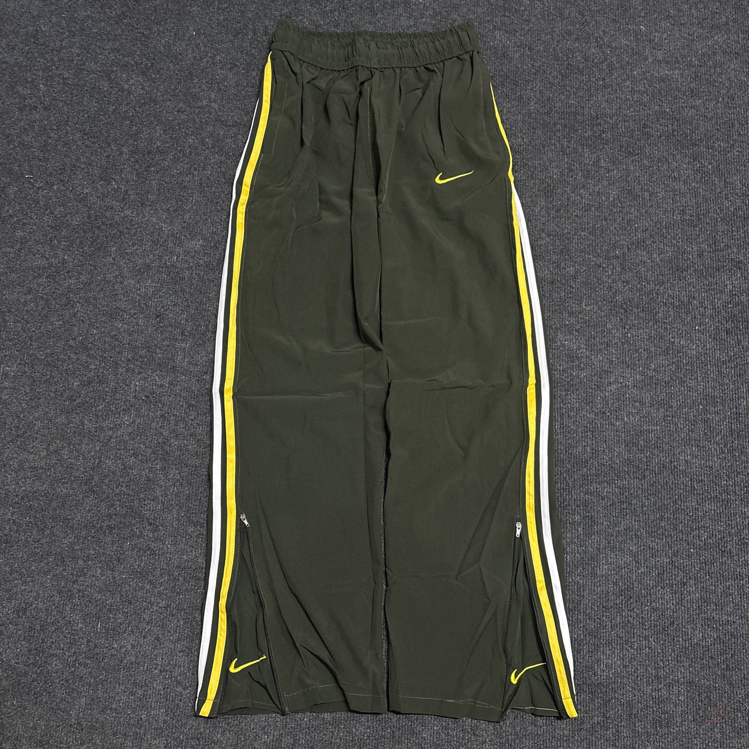 GREEN NIKE TRACK