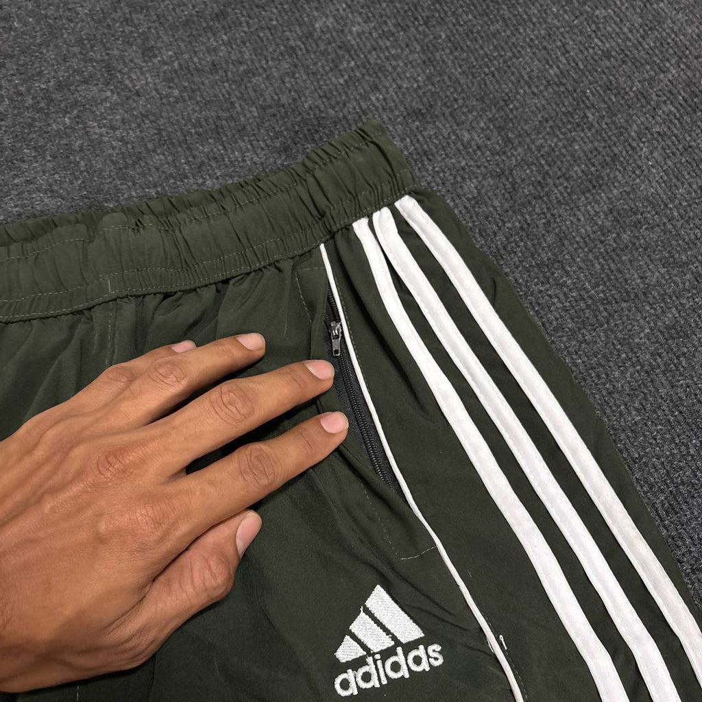 GREEN TRACK PANTS