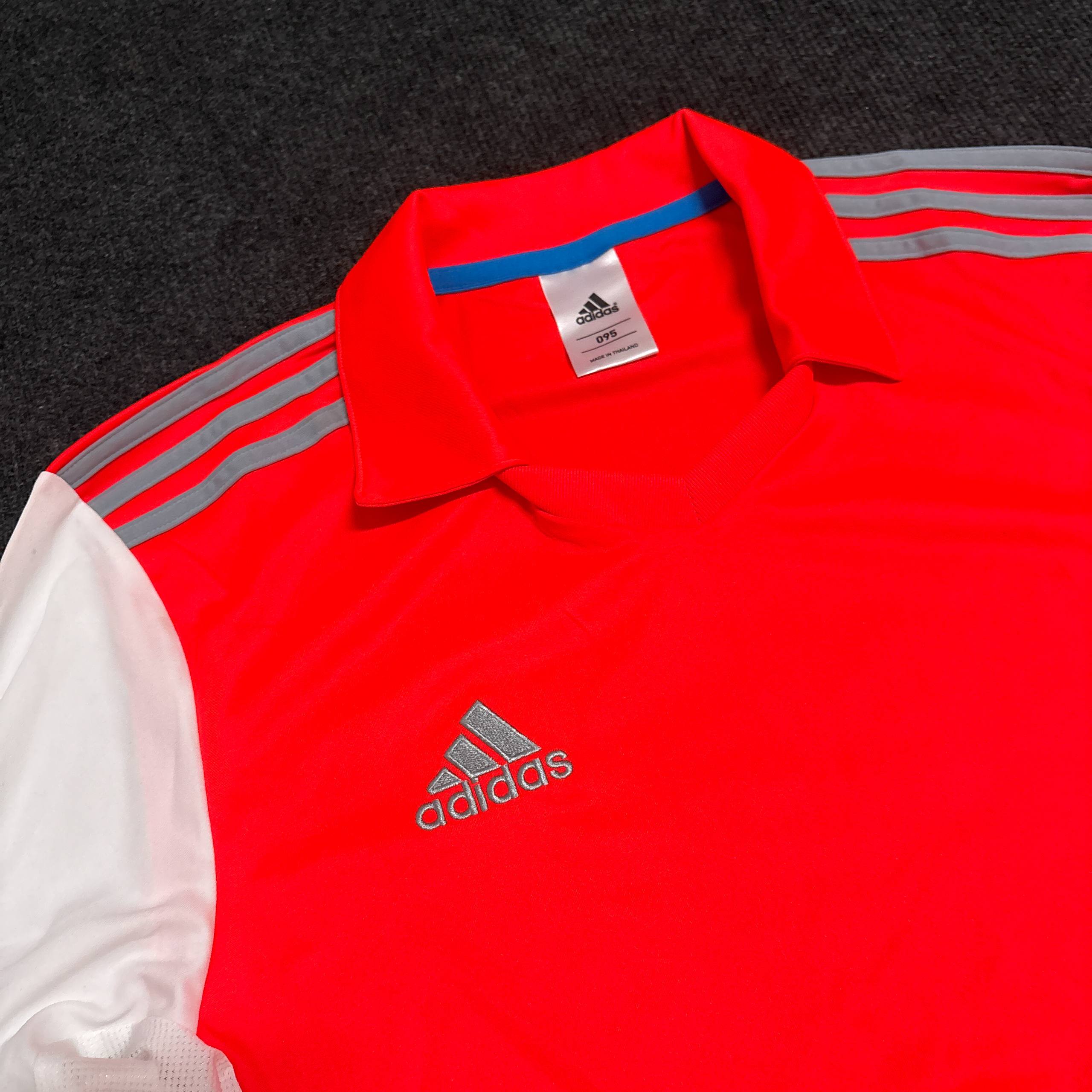 ADIDS ORANGE JERSEY