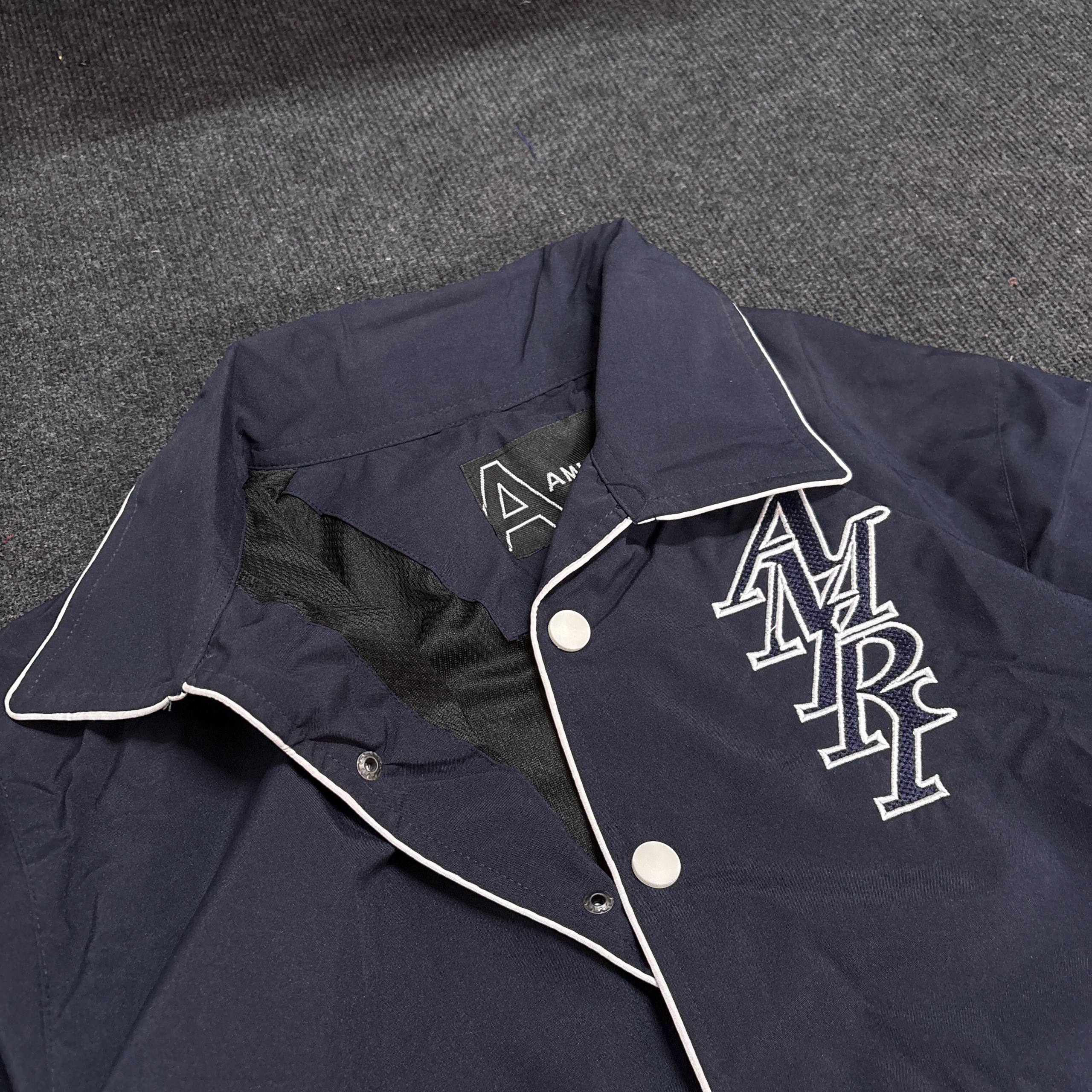 AMIRI BLUE VARSITY