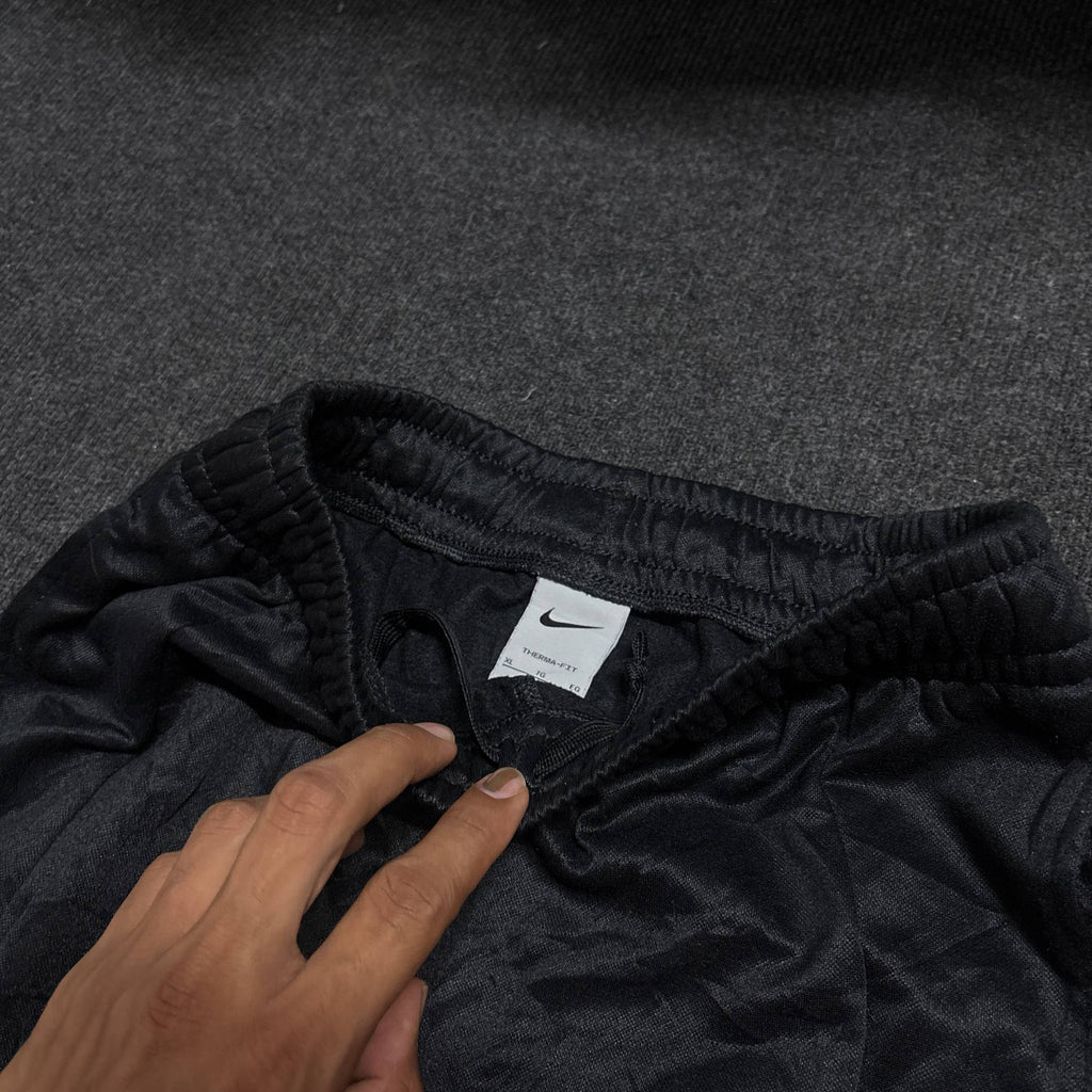 Nike black track