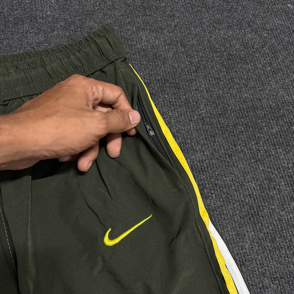 GREEN NIKE TRACK
