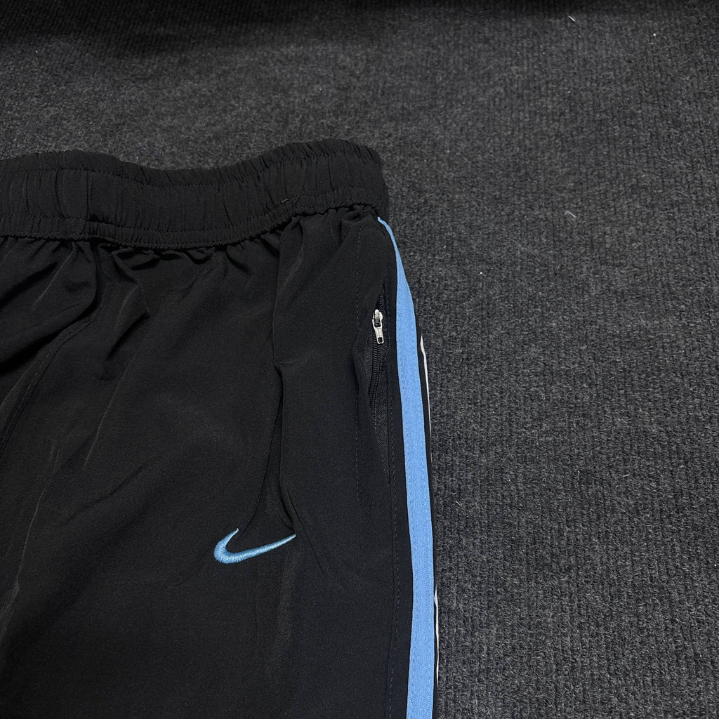 BLACK NIKE TRACK
