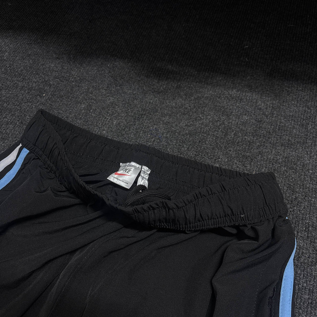 BLACK NIKE TRACK