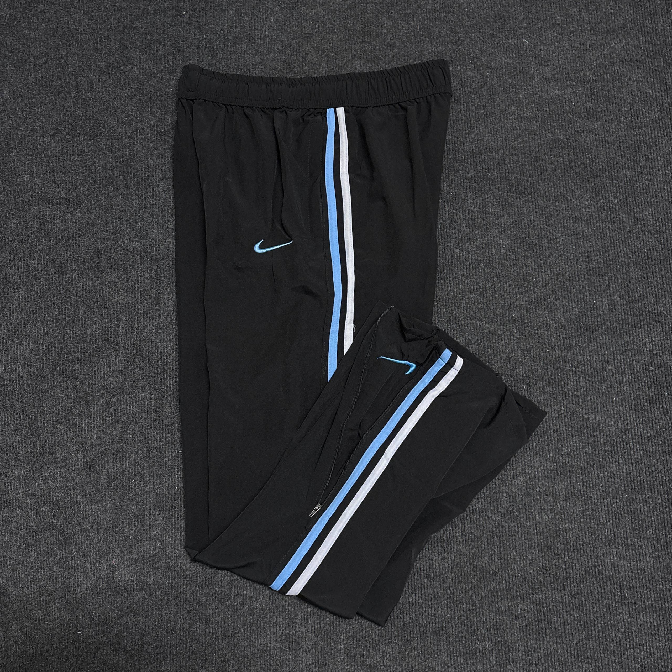BLACK NIKE TRACK